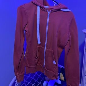 orange zip up